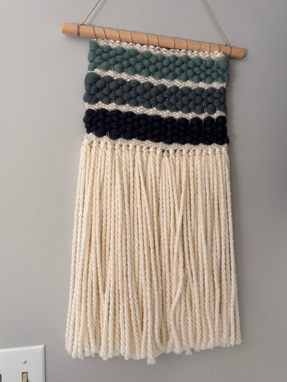Hand woven wall hanging